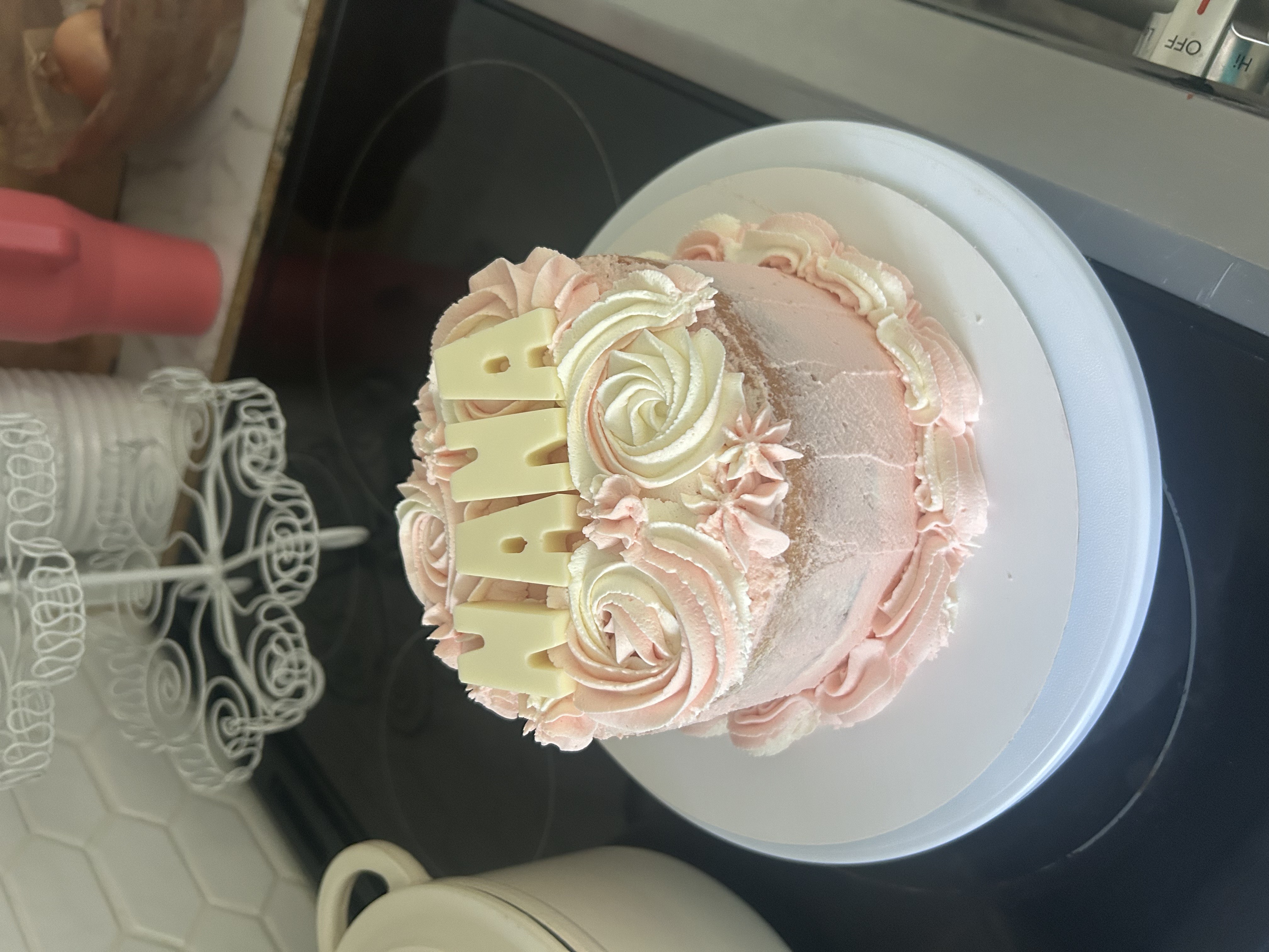 Pink personalized birthday cake by Treats by Paz